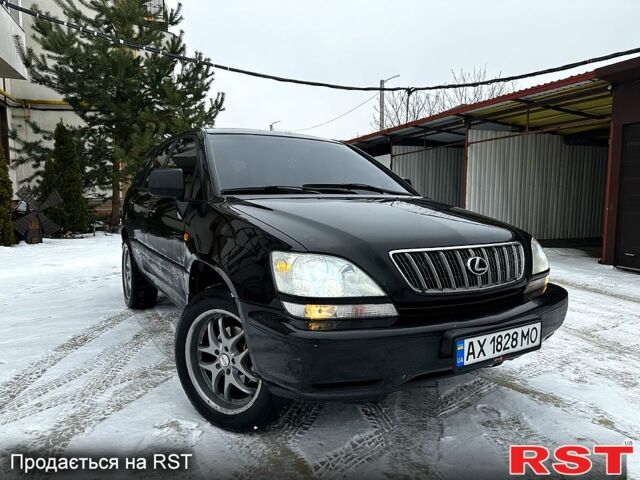 Черный Лексус РХ, объемом двигателя 3 л и пробегом 398 тыс. км за 5999 $, фото 2 на Automoto.ua