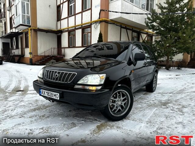 Черный Лексус РХ, объемом двигателя 3 л и пробегом 398 тыс. км за 5999 $, фото 1 на Automoto.ua