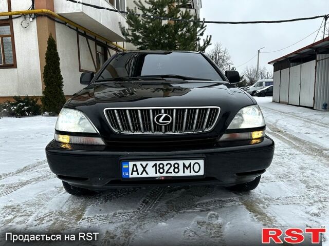 Черный Лексус РХ, объемом двигателя 3 л и пробегом 398 тыс. км за 5999 $, фото 3 на Automoto.ua
