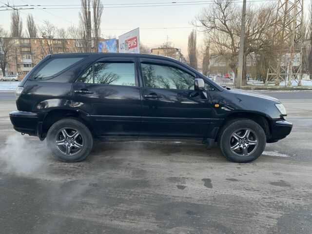 Черный Лексус РХ, объемом двигателя 3 л и пробегом 380 тыс. км за 5000 $, фото 2 на Automoto.ua