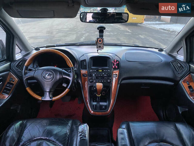 Черный Лексус РХ, объемом двигателя 3 л и пробегом 380 тыс. км за 5000 $, фото 11 на Automoto.ua