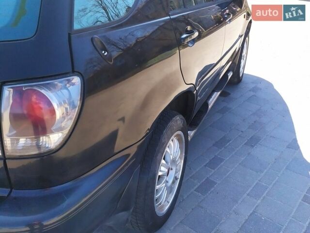 Черный Лексус РХ, объемом двигателя 3 л и пробегом 396 тыс. км за 7200 $, фото 16 на Automoto.ua