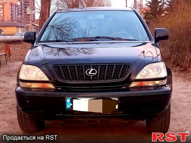 Черный Лексус РХ, объемом двигателя 30 л и пробегом 265 тыс. км за 6000 $, фото 1 на Automoto.ua