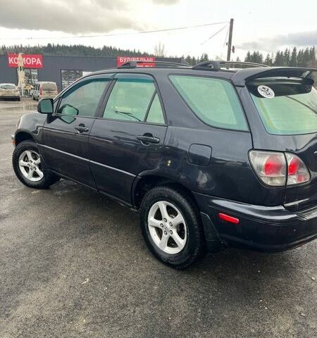 Черный Лексус РХ, объемом двигателя 3 л и пробегом 220 тыс. км за 6500 $, фото 2 на Automoto.ua