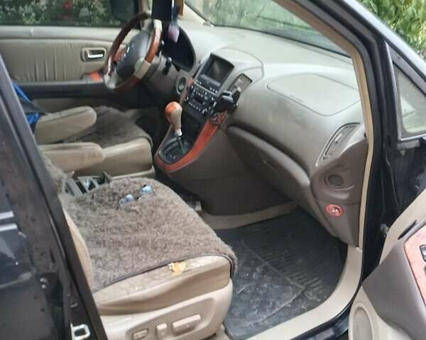 Черный Лексус РХ, объемом двигателя 3 л и пробегом 326 тыс. км за 5900 $, фото 4 на Automoto.ua