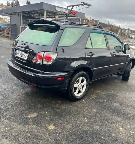 Черный Лексус РХ, объемом двигателя 3 л и пробегом 220 тыс. км за 6500 $, фото 3 на Automoto.ua