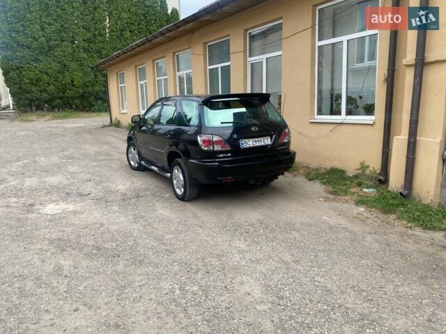 Черный Лексус РХ, объемом двигателя 3 л и пробегом 215 тыс. км за 7900 $, фото 1 на Automoto.ua