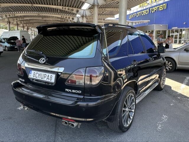 Чорний Лексус РХ, об'ємом двигуна 3 л та пробігом 280 тис. км за 7061 $, фото 1 на Automoto.ua