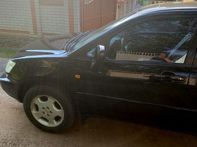 Черный Лексус РХ, объемом двигателя 3 л и пробегом 320 тыс. км за 5600 $, фото 7 на Automoto.ua