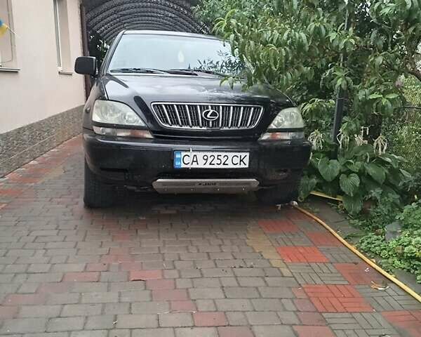 Черный Лексус РХ, объемом двигателя 3 л и пробегом 326 тыс. км за 5900 $, фото 1 на Automoto.ua