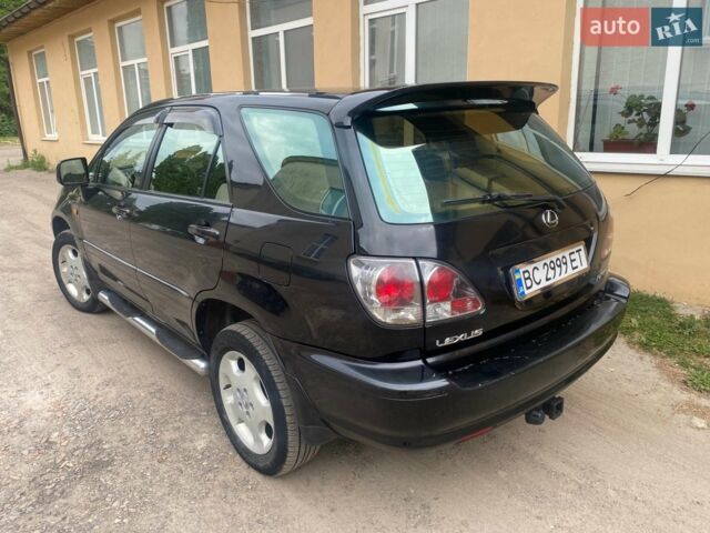 Черный Лексус РХ, объемом двигателя 3 л и пробегом 215 тыс. км за 7900 $, фото 2 на Automoto.ua