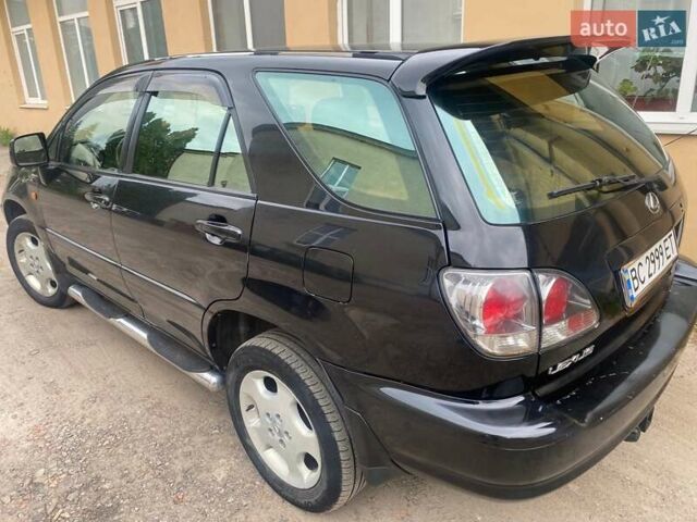 Черный Лексус РХ, объемом двигателя 3 л и пробегом 215 тыс. км за 7900 $, фото 4 на Automoto.ua