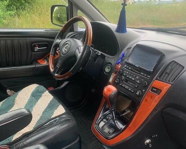 Черный Лексус РХ, объемом двигателя 3 л и пробегом 215 тыс. км за 7900 $, фото 20 на Automoto.ua