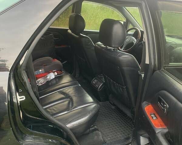 Черный Лексус РХ, объемом двигателя 3 л и пробегом 215 тыс. км за 7900 $, фото 18 на Automoto.ua