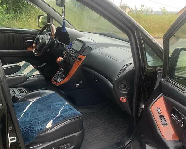 Черный Лексус РХ, объемом двигателя 3 л и пробегом 215 тыс. км за 7900 $, фото 19 на Automoto.ua