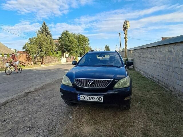Черный Лексус РХ, объемом двигателя 3.3 л и пробегом 349 тыс. км за 11000 $, фото 3 на Automoto.ua