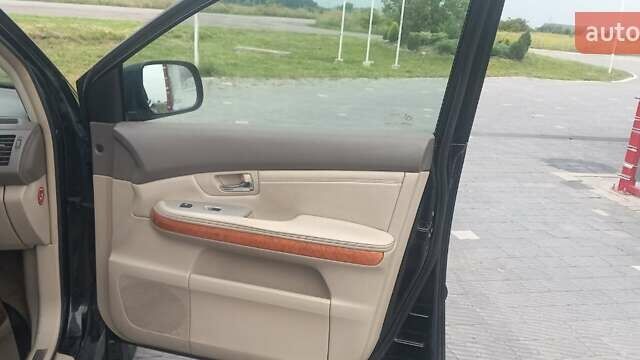 Черный Лексус РХ, объемом двигателя 3 л и пробегом 217 тыс. км за 6300 $, фото 3 на Automoto.ua