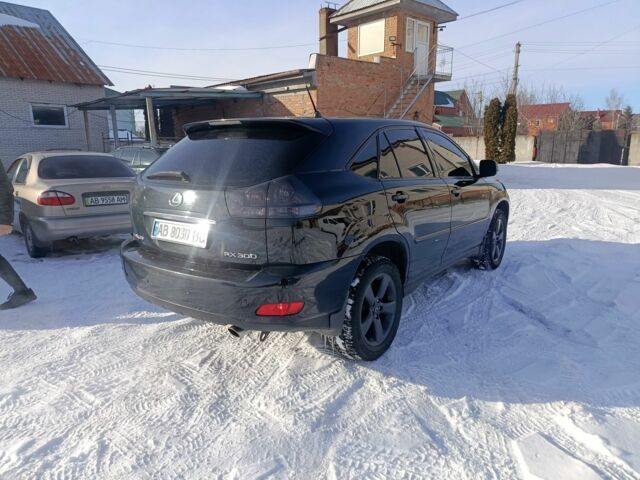 Чорний Лексус РХ, об'ємом двигуна 3 л та пробігом 251 тис. км за 9300 $, фото 4 на Automoto.ua