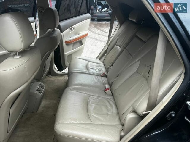 Черный Лексус РХ, объемом двигателя 3.3 л и пробегом 312 тыс. км за 6500 $, фото 13 на Automoto.ua