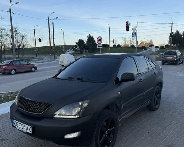 Черный Лексус РХ, объемом двигателя 3 л и пробегом 248 тыс. км за 5999 $, фото 1 на Automoto.ua