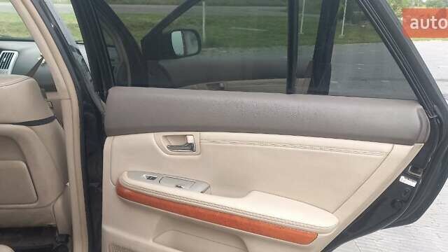 Черный Лексус РХ, объемом двигателя 3 л и пробегом 217 тыс. км за 6300 $, фото 2 на Automoto.ua