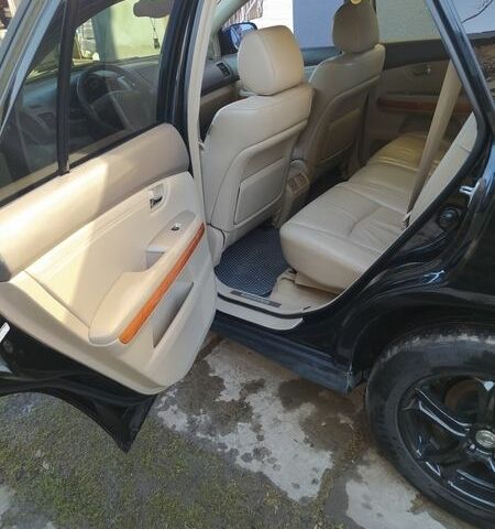 Черный Лексус РХ, объемом двигателя 3.31 л и пробегом 263 тыс. км за 7777 $, фото 2 на Automoto.ua