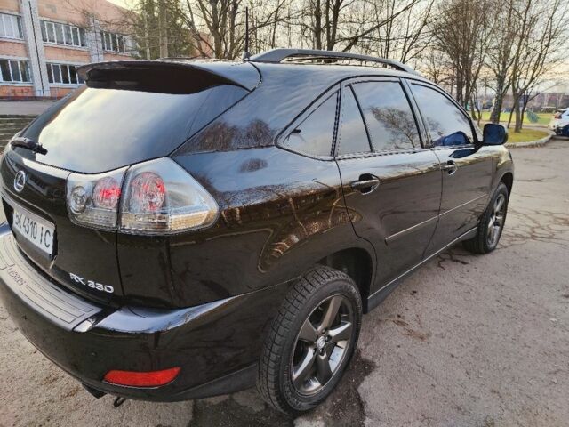 Черный Лексус РХ, объемом двигателя 3.3 л и пробегом 260 тыс. км за 8450 $, фото 1 на Automoto.ua