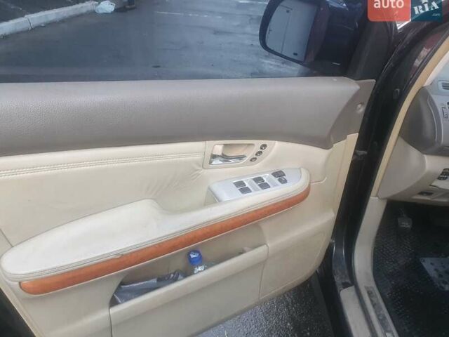 Черный Лексус РХ, объемом двигателя 3.3 л и пробегом 410 тыс. км за 7999 $, фото 2 на Automoto.ua