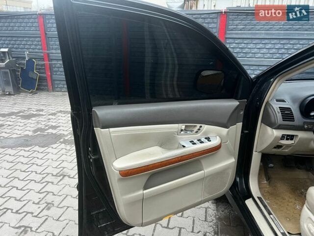 Черный Лексус РХ, объемом двигателя 3.3 л и пробегом 312 тыс. км за 6500 $, фото 6 на Automoto.ua