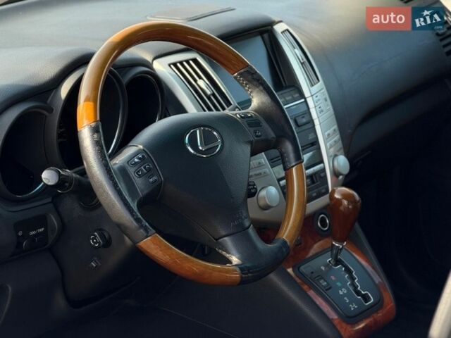 Черный Лексус РХ, объемом двигателя 3.3 л и пробегом 296 тыс. км за 10300 $, фото 28 на Automoto.ua