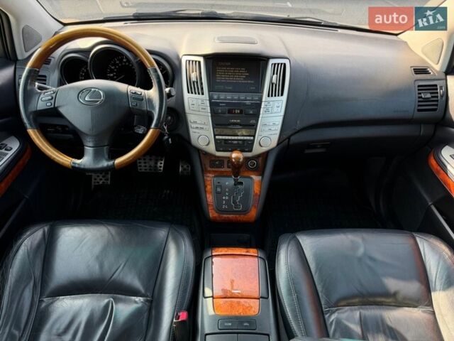 Черный Лексус РХ, объемом двигателя 3.3 л и пробегом 296 тыс. км за 10300 $, фото 22 на Automoto.ua