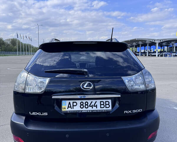 Черный Лексус РХ, объемом двигателя 3 л и пробегом 322 тыс. км за 8600 $, фото 2 на Automoto.ua