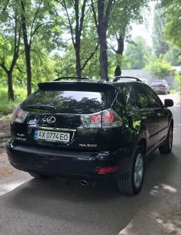 Черный Лексус РХ, объемом двигателя 3 л и пробегом 218 тыс. км за 8999 $, фото 3 на Automoto.ua
