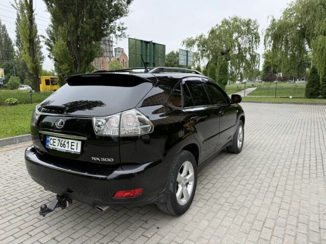 Черный Лексус РХ, объемом двигателя 3 л и пробегом 238 тыс. км за 8895 $, фото 7 на Automoto.ua