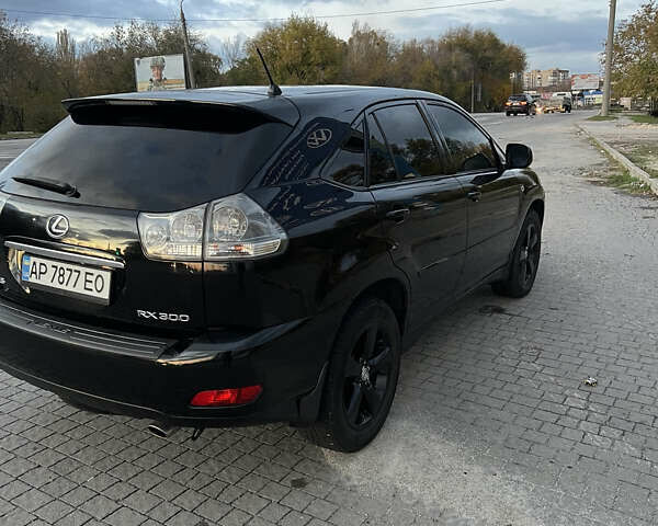 Чорний Лексус РХ, об'ємом двигуна 3 л та пробігом 267 тис. км за 9300 $, фото 2 на Automoto.ua