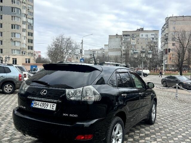 Черный Лексус РХ, объемом двигателя 3 л и пробегом 232 тыс. км за 8300 $, фото 2 на Automoto.ua