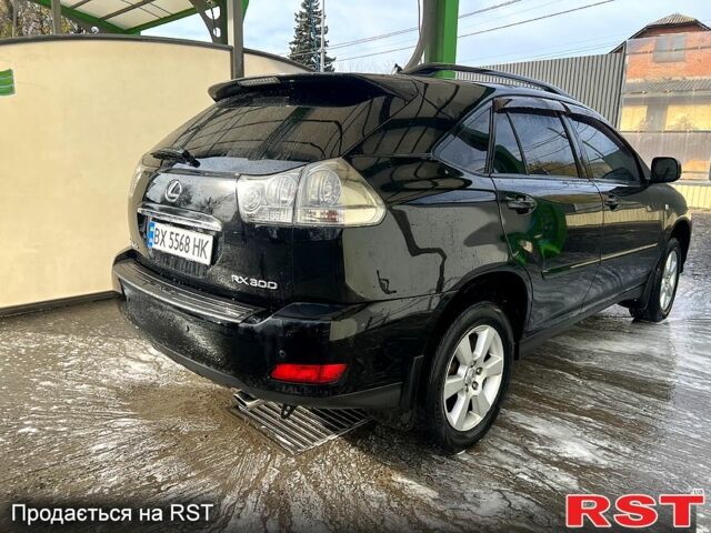 Черный Лексус РХ, объемом двигателя 3 л и пробегом 285 тыс. км за 9500 $, фото 3 на Automoto.ua