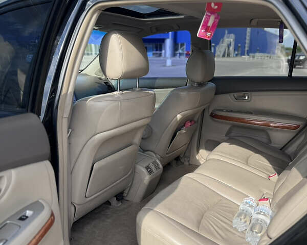 Черный Лексус РХ, объемом двигателя 3 л и пробегом 322 тыс. км за 8600 $, фото 10 на Automoto.ua