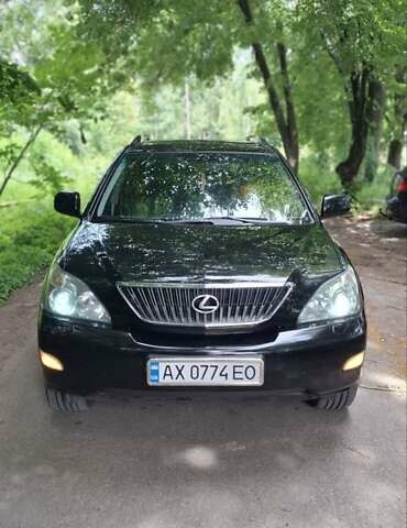 Черный Лексус РХ, объемом двигателя 3 л и пробегом 218 тыс. км за 8999 $, фото 1 на Automoto.ua