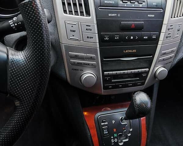 Черный Лексус РХ, объемом двигателя 3 л и пробегом 297 тыс. км за 8500 $, фото 2 на Automoto.ua