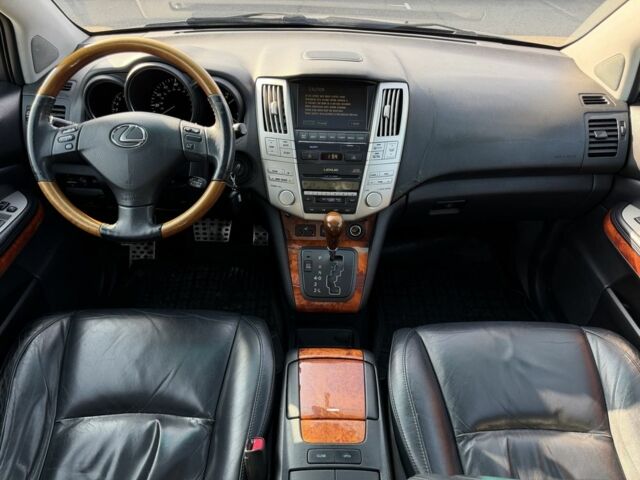 Черный Лексус РХ, объемом двигателя 3.3 л и пробегом 296 тыс. км за 10300 $, фото 2 на Automoto.ua