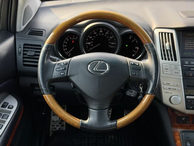 Черный Лексус РХ, объемом двигателя 3.3 л и пробегом 296 тыс. км за 10300 $, фото 3 на Automoto.ua