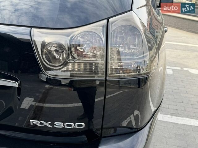 Черный Лексус РХ, объемом двигателя 3 л и пробегом 297 тыс. км за 7999 $, фото 28 на Automoto.ua