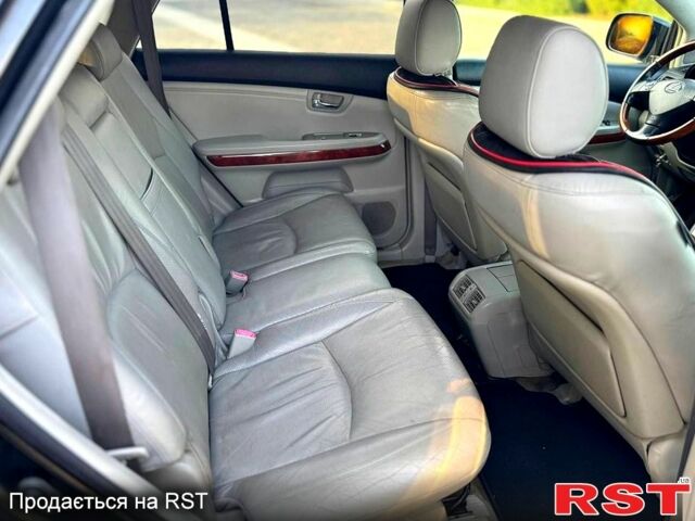 Черный Лексус РХ, объемом двигателя 3 л и пробегом 200 тыс. км за 6850 $, фото 5 на Automoto.ua