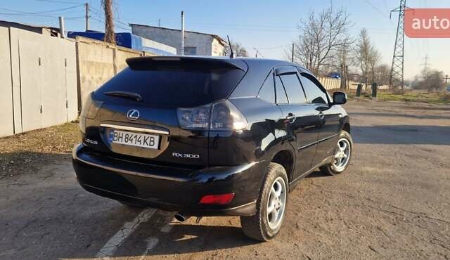 Чорний Лексус РХ, об'ємом двигуна 3 л та пробігом 297 тис. км за 8500 $, фото 1 на Automoto.ua
