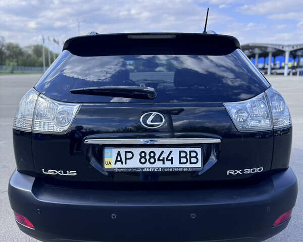 Черный Лексус РХ, объемом двигателя 3 л и пробегом 322 тыс. км за 8600 $, фото 3 на Automoto.ua