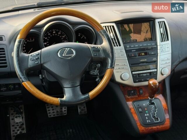 Черный Лексус РХ, объемом двигателя 3.3 л и пробегом 296 тыс. км за 10300 $, фото 24 на Automoto.ua
