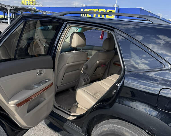 Черный Лексус РХ, объемом двигателя 3 л и пробегом 322 тыс. км за 8600 $, фото 11 на Automoto.ua