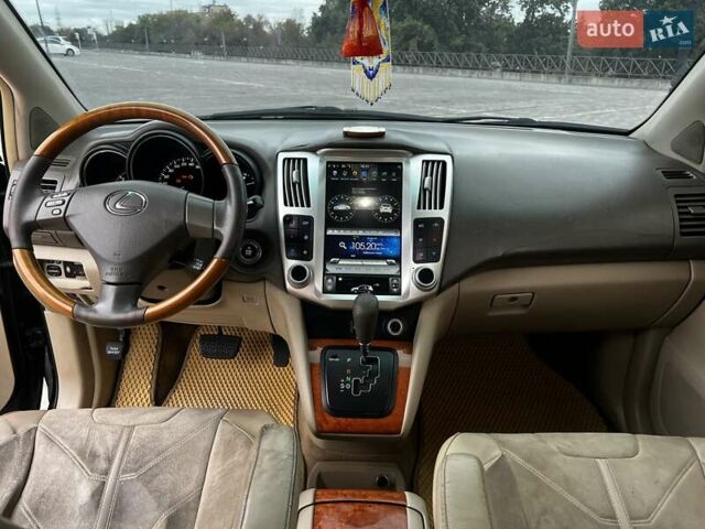 Черный Лексус РХ, объемом двигателя 3.3 л и пробегом 279 тыс. км за 9700 $, фото 4 на Automoto.ua