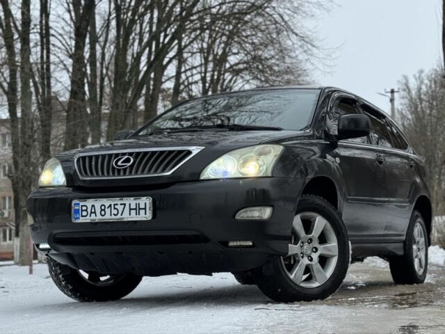 Черный Лексус РХ, объемом двигателя 2.4 л и пробегом 287 тыс. км за 6350 $, фото 1 на Automoto.ua